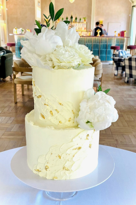 2 Tier Buttercream Textured Cake with fresh peonies and gold leaf detail at LIMEKILN Sussex